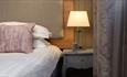 Lamp and bed at The Seaton Lane Inn