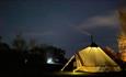 A tent at night