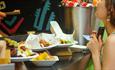 Image of someone enjoying a selection of delicious street food dishes in Bishop Auckland.