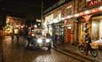 A Christmas evening at Beamish Museum with a vintage car and Christmas lights