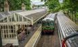 Train pulling into station on Weardale Railway