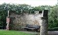 Battlement and bench and Wharton Park