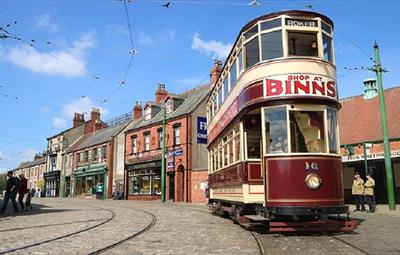 1900s Town, Street at Beamish Museum with Tram running through it.