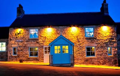 Exterior view of Black Horse Beamish during the evening