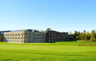 Exterior of Ramside Hall Hotel, green lawn in foreground