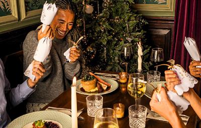 People enjoying festive meals at Cosy Club