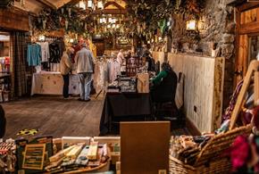 Image of people browsing Christmas Market stalls at South Causey Inn