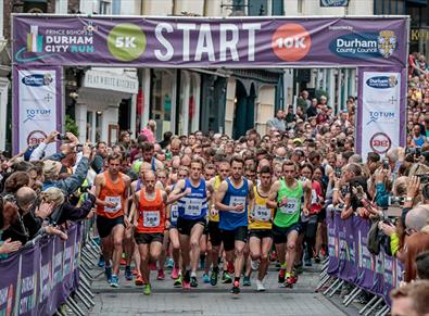 runners set off rom the start line of Durham City Run