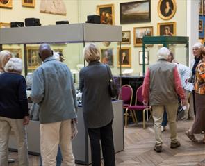 People looking at an exhibition at Bowes Museum