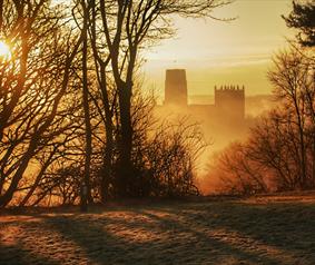 view of Durham Cathedral during sunrise from Observatory Hill 