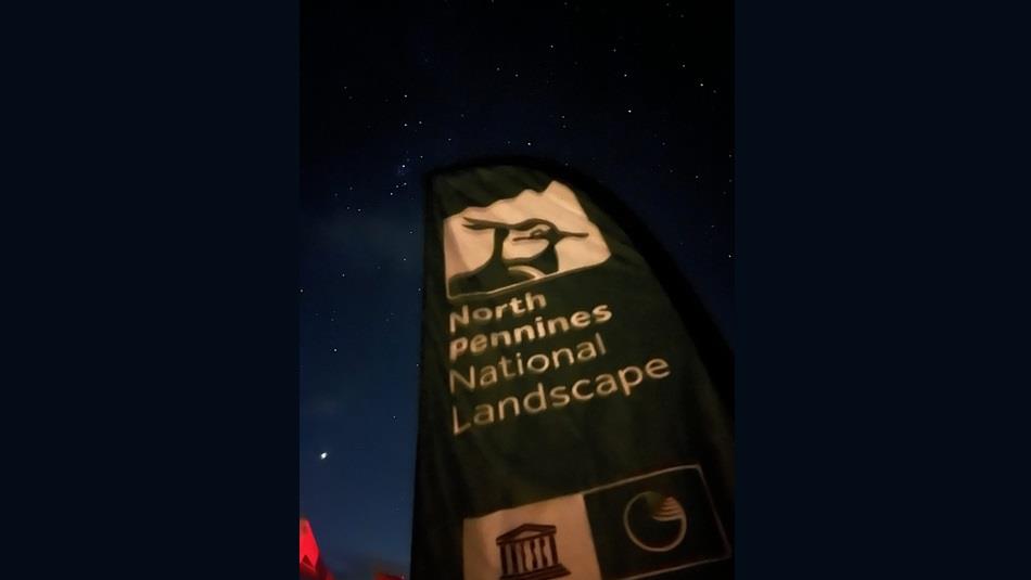 North Pennines National Landscape wording and flag reflection in the night's sky North Pennines National Landscape wording and flag reflection in the night's sky