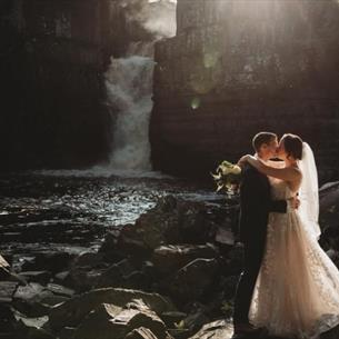 Wedding couple by High Force Waterfall