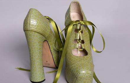 Green coloured Vivienne Westwood shoes.