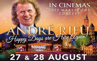 Cinema poster of Andre Rieu, standing over an image of Maastricht in the evening.