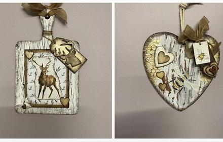Two examples of hand made wall plaques.  One square and one heart shaped.