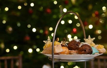 Christmas Afternoon Tea at High Force Hotel. Image of treats and fairy lights.
