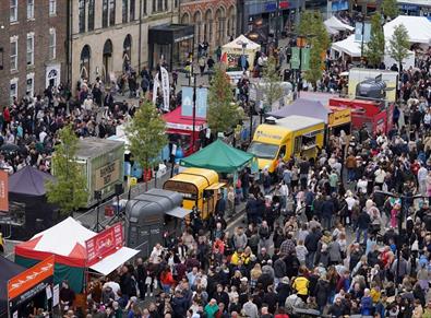 Aerial view of the crowds of people attending Bishop Auckland Food Festival