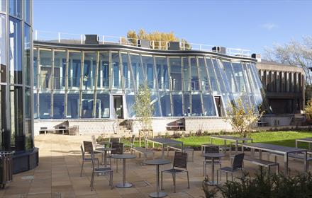 Business School with glass frontage and seating area