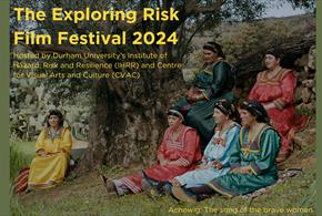 Exploring Risk Film Festival promotion.  Six women in traditional dress sitting on a hillside beside a tree