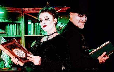 Tales From A Haunted Bookshop: actors dressed in black halloween attire.