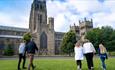 family walking towards Durham Cathedral