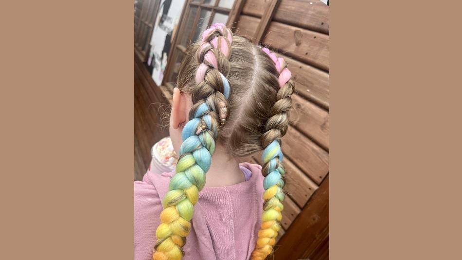 Young girl with coloured hair braids