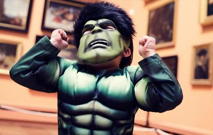 Child dressed as 'The Hulk' at The Bowes Museum.