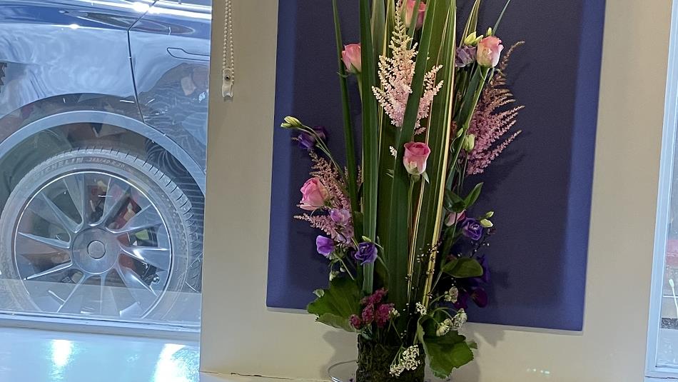 A beautiful arrangement of pink and purple flowers.