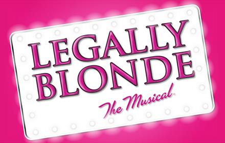 Legally Blonde The Musical sign with white and pink background.