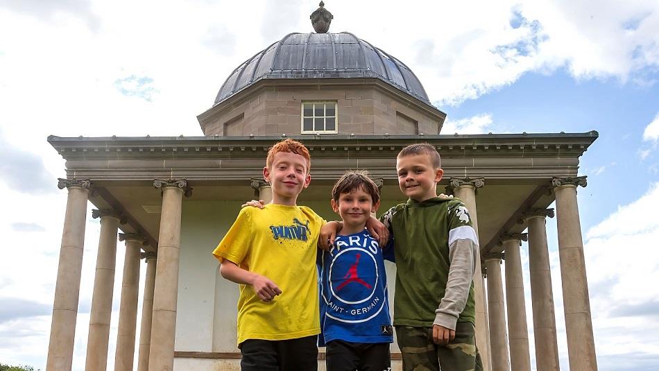 Image of three children outside the Temple of Minerva at Hardwick Park.