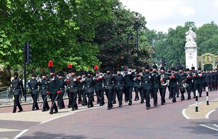 The Rifles band playing and marching.