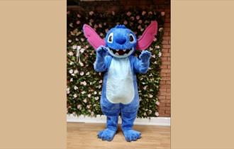 Someone dressed up as the character Stitch