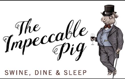 Image of a pig dressed impeccably.