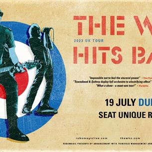 Poster showing Pete Townsend with guitar and Roger Daltrey in background with details of concert location.
