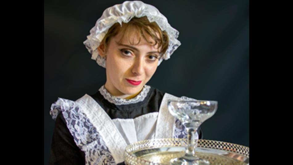 A maid serving a drink. A maid serving a drink.