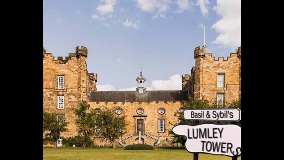Lumley Castle Exterior and a sign which reads, 'Basil & Sybil's Lumley Towers' Lumley Castle Exterior and a sign which reads, 'Basil & Sybil's Lumley Towers'