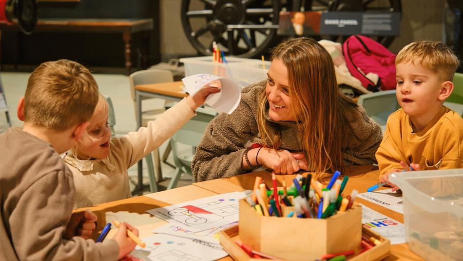 Adults and children enjoying craft activities at Locomotion. Adults and children enjoying craft activities at Locomotion.