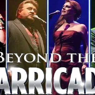 Four members of the Beyond the Barricade's cast performing. 