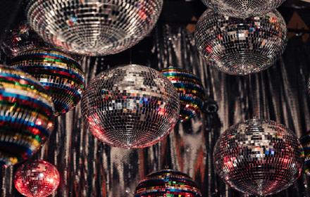 Image of glittery disco balls.