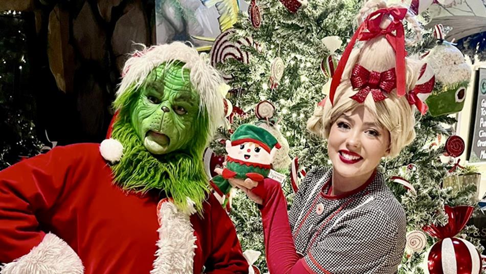 Mr. Grinch and Cindy-Lou posing for a photo in front of a Christmas tree at Lanchester Garden Centre. Mr. Grinch and Cindy-Lou posing for a photo in front of a Christmas tree at Lanchester Garden Centre.