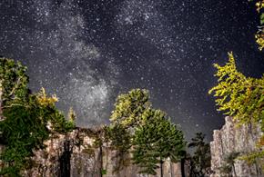 Stargazing Suppers at High Force Waterfall. Image of a starry sky above High Force.