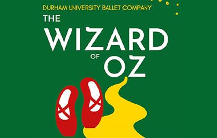 Durham University Ballet Company present 'The Wizard of Oz'. Image of red shoes and a yellow brick road.
