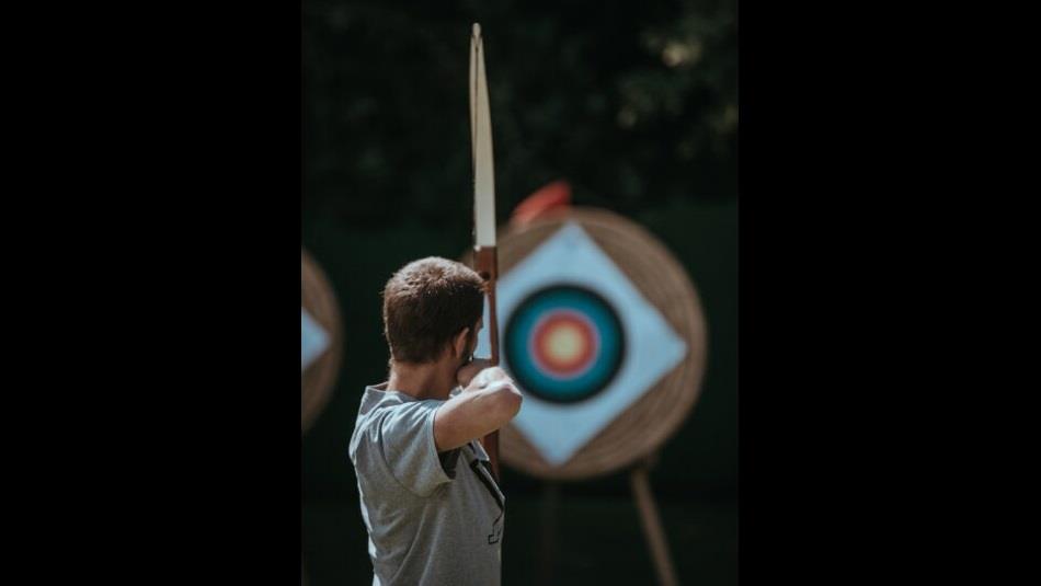 Image of an archer aiming for the bullseye.
