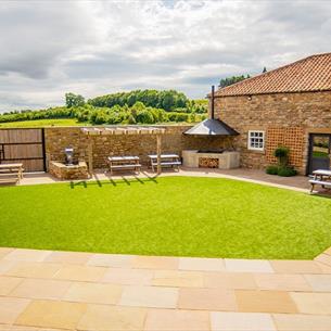 Cafe courtyard, paving, grassed area, BBQ