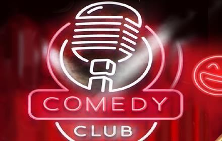 Image of a microphone, and neon lights showing a smiling face and the words, 'Comedy Club'.