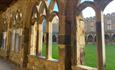 the cloisters at Durham Cathedral on a sunny day.