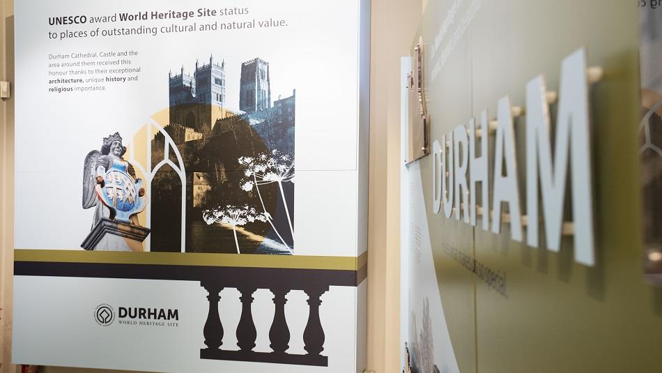 Image of an information board showing Durham Cathedral and text describing the World Heritage Site at Palace Green Library.