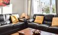 Comfy sofas in the living room at Glebeside Retreat Satley