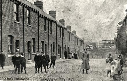 Photograph of people standing in the street named Sea View, later know as Second Street, Horden, 1900