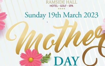 place and date of event at top, the words Mother's day in big letters in centre surrounded by pink flowers